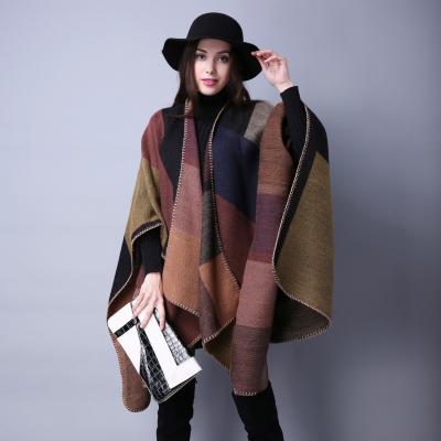 China Wild artificial wool autumn and winter scarf plaid ladies travel and American cashmere faux shawl European folk style slit thickened coat for sale