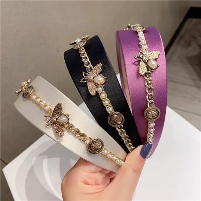 China Newest Vintage Pearl Hairbands Temperament Retro Headband Bee Court Antique Gold Wide Circle Hair Chain Hair Accessories for sale