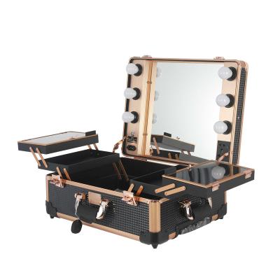 China Fashion Voice Control Makeup Rolling Case With LED Light Mirror Adjustable Legs Train Table Studio Lockable Studio Artist for sale