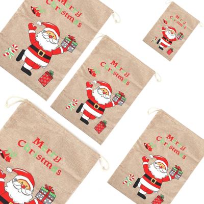 China Customized Xmas Gift Drawstring Bag Gift Small Christmas Canvas Pouch for sale