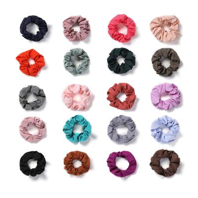 China Popular wholesale colorful beautiful hair accessories simple circle hair cloth headdress small girl hair accessories for sale