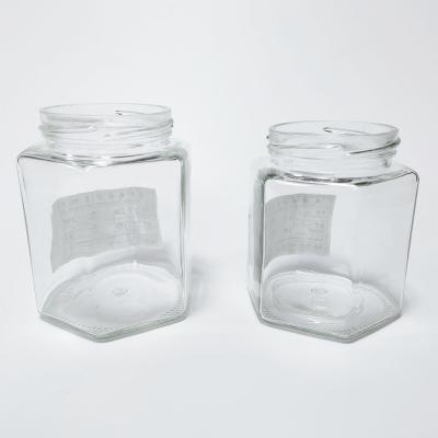 China Wholesale High Quality Food Storage Glass Jam Bottle Honey Food Container Hexagon Glass Jar for sale