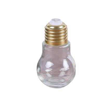 China Glass Beverage Bulb Shape Beverage Juice Bottle With Screw Lid for sale