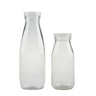 China Premium Juice Milk Packaging 200ml Fruit Glass Beverage Bottle Fruit Juice Bottle With Lid for sale