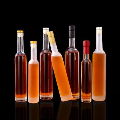 China 200ml 375ml 500ml Beverage Stocked Customized Round Transparent Shape Ice Glass Wine Bottle For Wine for sale