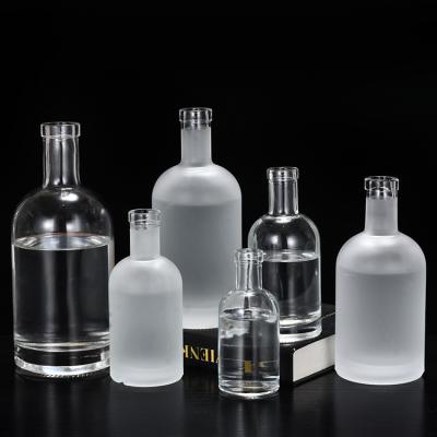 China 200ml 375ml 500ml 750ml 1000ml round liquor glass bottle for whiskey, rum, tequila, vodka, liquor, wine for sale