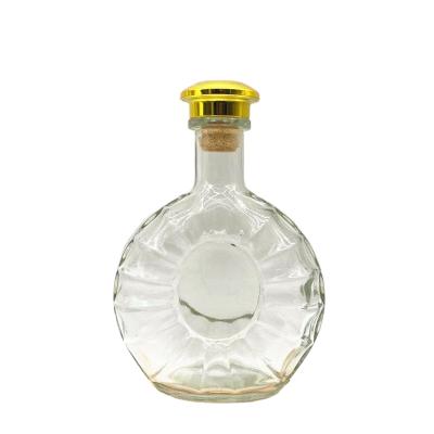 China 2021 Vodka Oval 500ml 750ml Vodka Spirit Glass Bottle With Rum Cork Liquor Glass Bottle for sale