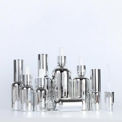 China 5ml 10ml 15ml 20ml 30ml 50ml 100ml cosmetic silver screw cap essential oil bottle with dropper for sale