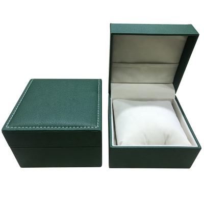 China Plastic+Pu leather or special paper green pebbled leather elegant watch case with white velvet pillow for sale