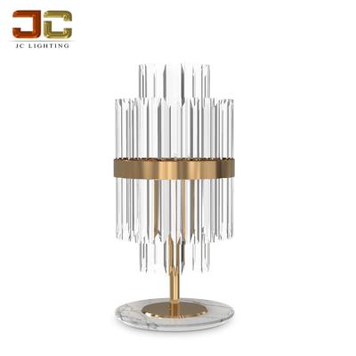 China Unique Modern Creative Stainless Gold Table Lamp K9 Strip Table Lamp Crystal Clear Design for sale