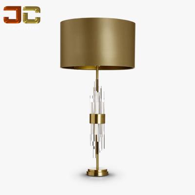 China New modern style modern fabric crystal glass steel table lamp for bedroom for sale