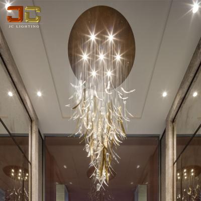 China Residential JC CUSTOM LIGHTING Modern Luxury Crystal Glass Living Room Leaf Element Drop Chandelier Lighting for Hotel Staircase for sale