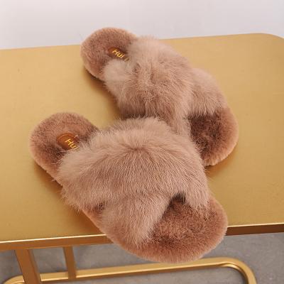 China Fashion Trend Women's Fashion Cross Soft Plush Faux Rabbit Furry Slipper For Women Winter Bedroom Indoor Slipper for sale