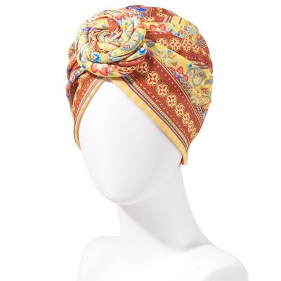 China Fashion New Europe and the United States popular retro headscarf hat African whirl disk flower hat Bohemian fashion ball for sale