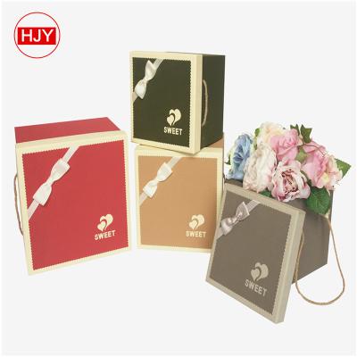 China Recycled Materials Paper Flower Decorated Luxury Style Wedding Candy Packaging Paper Box For Chocolate Gifts for sale