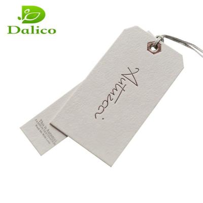 China Sustainable Wholesale Custom Garment Hang Tags Packaging Cardboard Labels For Apparel for sale