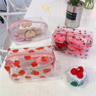 China Wholesale Recyclable Transparent Waterproof Cosmetic Bag PVC Cute Cartoon PVC Makeup Bag Small Girl Wash Storage Bag for sale