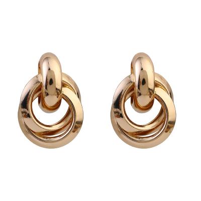 China Three TRENDY S925 Alloy Silver Simple Female Stud Earrings Fashion High End Round Metal Earrings for sale