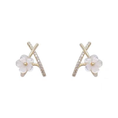 China Trendy Soft Geometric Cross Stud Earrings Flower Style Temperament Fashion Female Single Earrings for sale