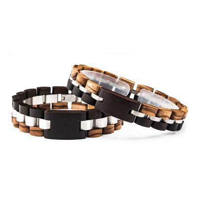 China Customized CLASSIC Ebony Wood Fashion Jewelry Stainless Steel Bracelet Mixed Wood Bracelets Versatile And for sale