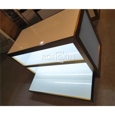 China Simple Custom Commercial Jewelry Store Display Showcase Factory Outlet Fixture Bespoke Gold Metal Steel Decorative Table Showcase With LED for sale