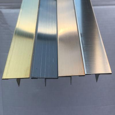 China Modern 304 Stainless Steel Tile Trim T Shape Mounted Gold Mirror Metal Decoration Trim for sale