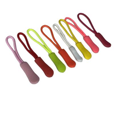 China Garment Accesories Sewing Button Factory String Cord Colorful Bag Zip Slider Pvc Silicone Rubber Custom Zipper Pull High Quality Eco-Friendly Tpu Head for sale