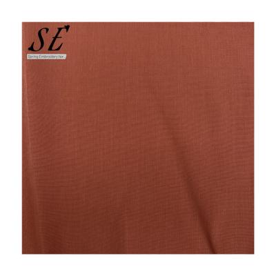 China Breathable polyester/rayon Cooper Imitation Ammonia single jersey fabric plain dyed woven fabirc for gament 601 for sale