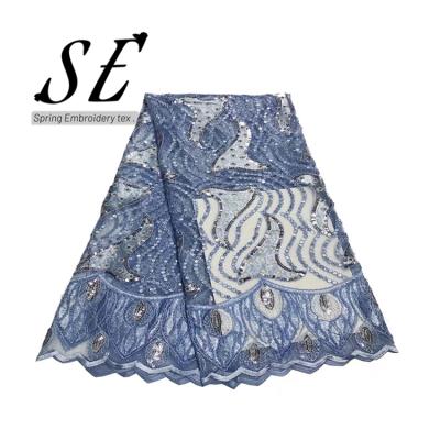 China Beautiful soft blue color French organza lace fabrics embroidery wedding organza sequins lace up fabrics for dress for sale