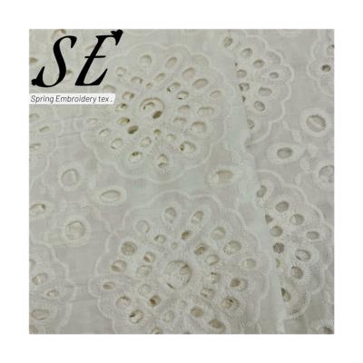 China Breathable Wholesale Floral Luxury Eyelet Embroidery Fabric For Woman Dress Baby Kids Clothes 210120 for sale