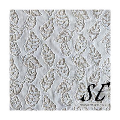 China Breathable Dyed 100% Poly Fabric Floral Luxury Lace Up Eyelet Embroidery Fabric Great For Woman Dress Beach Wear 210386 for sale