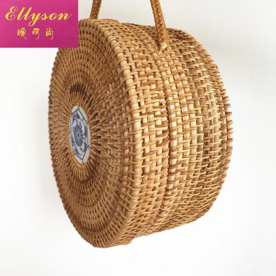 China Ellyson Ratten Preppy Style Bags for Women - Unique Handmade Straw Bag for Women with Leather Strap for sale