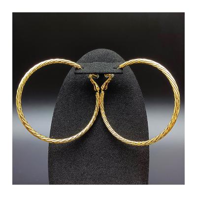 China ODM Vintage Guangding Brincos De Festa Pretty Twisted Round Earrings for sale