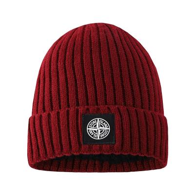 China COMMON wholesale high quality plus thicker knitted hat cheap winter skull cap women hat wine red hat for sale