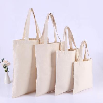 China Custom Made Eco Friendly Wholesale Handled Large Capacity Cotton Bag Shopping Bag Nature Color Shopping Bags With Logos for sale