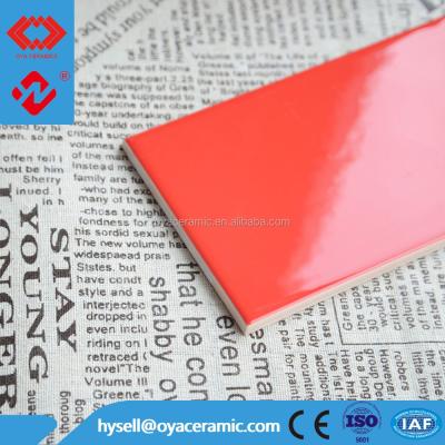 China Glazed Metallic Tiles 100x200mm Ceramic Wall 4x8 Tile With Full Glazed Living Red Color for sale