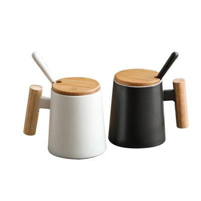 China Viable Fashion Custom Logo And Wooden Handle Black Matte Mug Ceramic Coffee Cup Set for sale