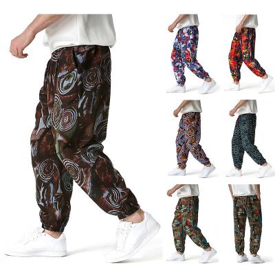 China Anti-wrinkle factory direct sales corduroy plus size windproof pants and pants red unisex cool pants for sale