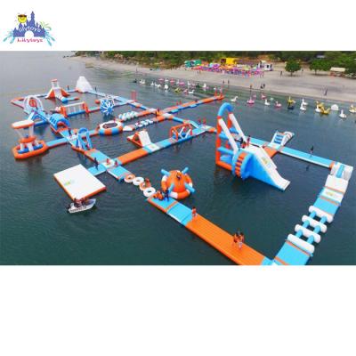 China Floating Aqua Rental Park Lilytoys Water Play Equipment Obstacle Water Park Floating Equipment With Slide For Party Rentals for sale