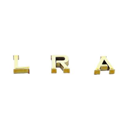 China Durable Customized Golden Mini Sign 3d Stainless Steel Letter Sign For Handbag Logo for sale