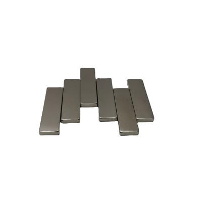 China Industrial Magnet Sintered NdFeB Magnetite Cuboid Super Strong Magnets Fit Neodymium Magnet Block for sale