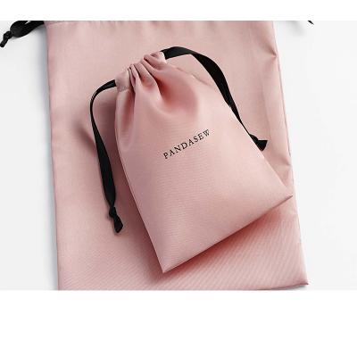 China Recyclable Customize Personalized Satin Dust Dust Gift Wig Drawstring Jewelry Pouch White Black White Bag With Logo for sale