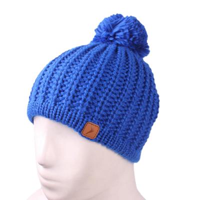 China COMMON 100% Acrylic Custom Adults Knitted Plain Toque Adjustable Woven Label Pom Pom Beanie Hats for sale