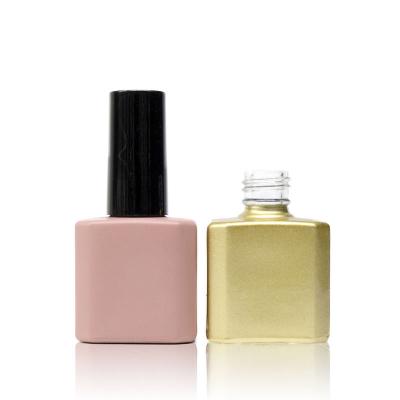 China Personal Care Wholesales Empty Long 10ml UV Gel Nail Polish Bottle Gold Nail Polish Luxury Round Cap Bottle for sale