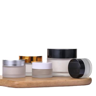 China Durable wholesale luxury cosmetic empty blasck face airless glass 10ml 15ml 30ml 50ml 130ml 10 gram cream jar for sale