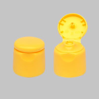 China 20mm Flip Top Plastic Caps , Shampoo Shower Gel Bottle Flip Cap Yellow Color for sale