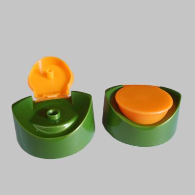 China 200ml 400ml Bottle Flip Top Plastic Caps Double Color Oval Closures for sale