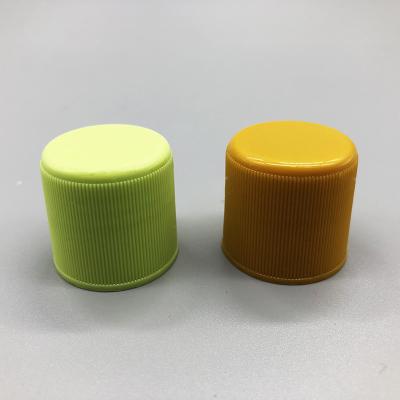 China 24mm Ribbed Plastic Bottle Screw Caps Daily Use Water Bottle End Cap Lids for sale