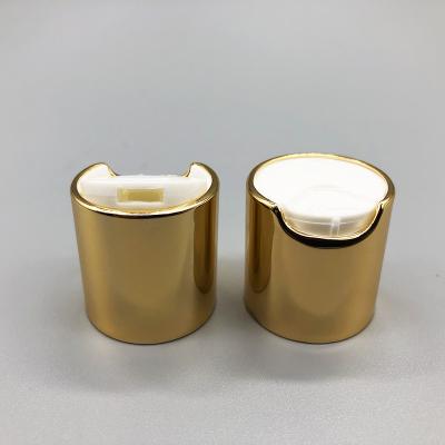 China Small Plastic Disc Cap One Handed Dipensing Aluminum Gold Metalized for sale