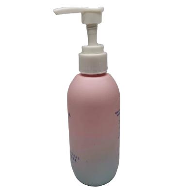 China Cosmetic Matte Pink With Blue Color Plastic Lotion Bottle PLA Shampoo Bottle With Cap for sale